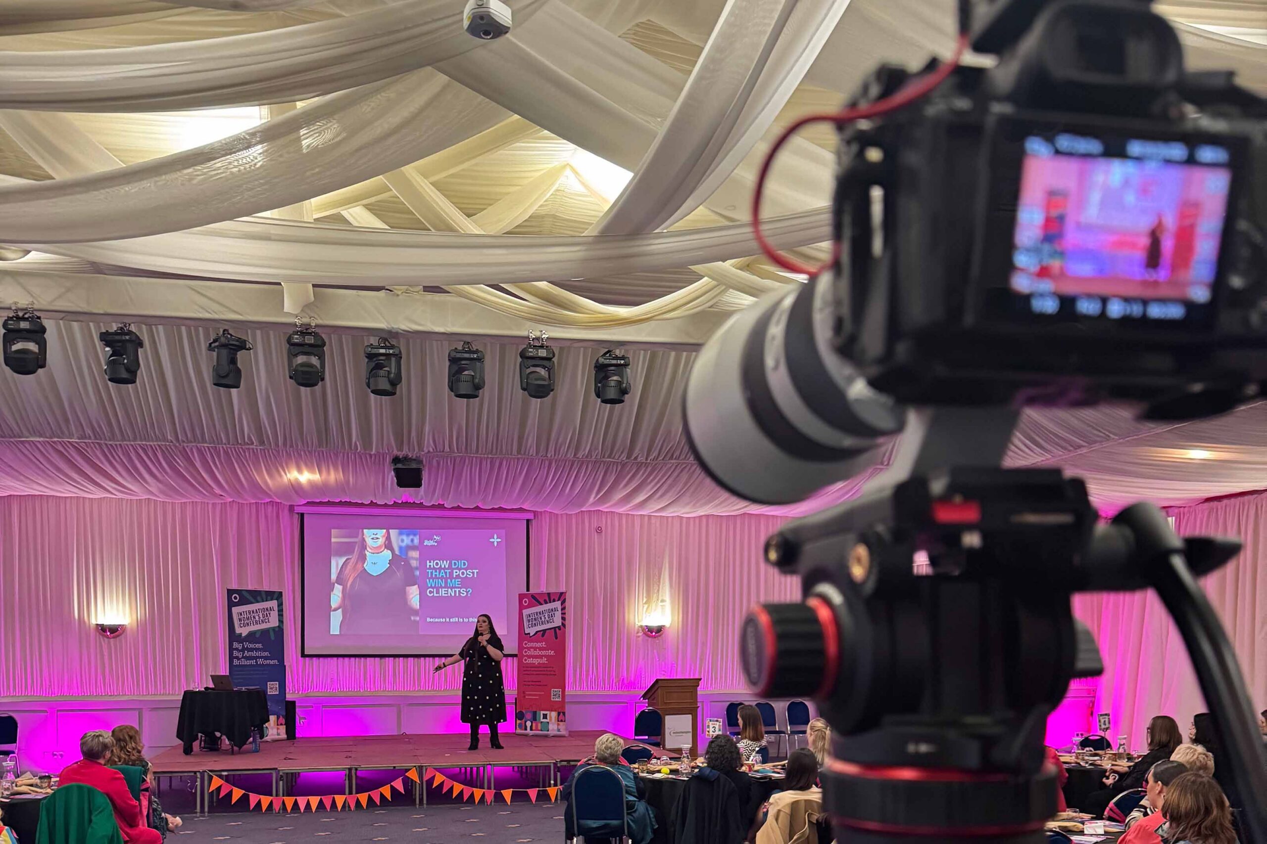 Filming a speaker on stage at the IWD Wolverhampton conference